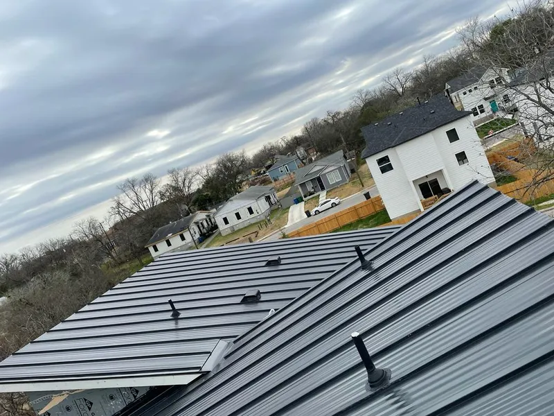 Standing seam metal roof panels with vents for Skylight Repair in Pigeon Forge